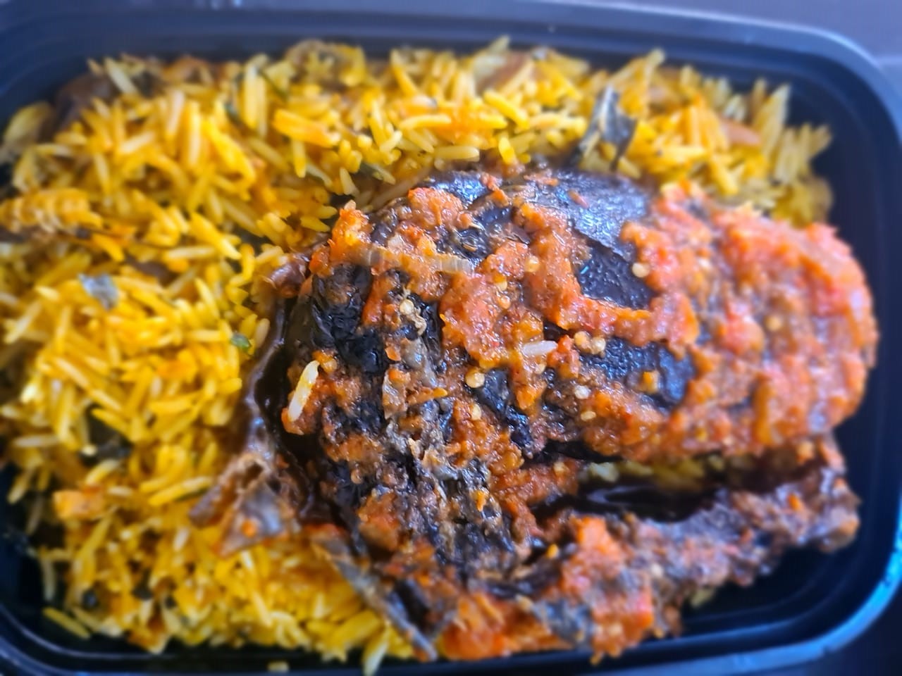 Natives Signature rice with Dryfish and Pomo